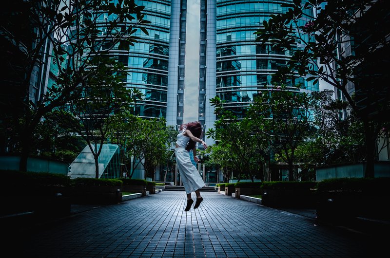 On Sunday, I was exploring my girlfriend’s workplace business centre in Bangsar South City, Kuala Lumpur. Come to my surprise there was nobody in the area and I have my camera with me back in my car. The idea of the photo was initially making her looked like she is dancing in the sky, it was until she was starting to land on the ground I took another chance to take another picture. I find it looked like she is floating in the air, took some edit and this seems to be the best photo I took.
